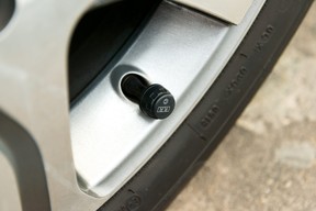 Valve stem on a wheel with a modern Tire Pressure Monitoring Sensor installed