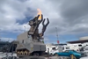 A screenshot from a video of a robotic dinosaur waiting to board a BC Ferry in May 2023